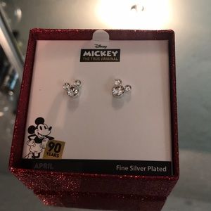 Mickey Mouse earrings.